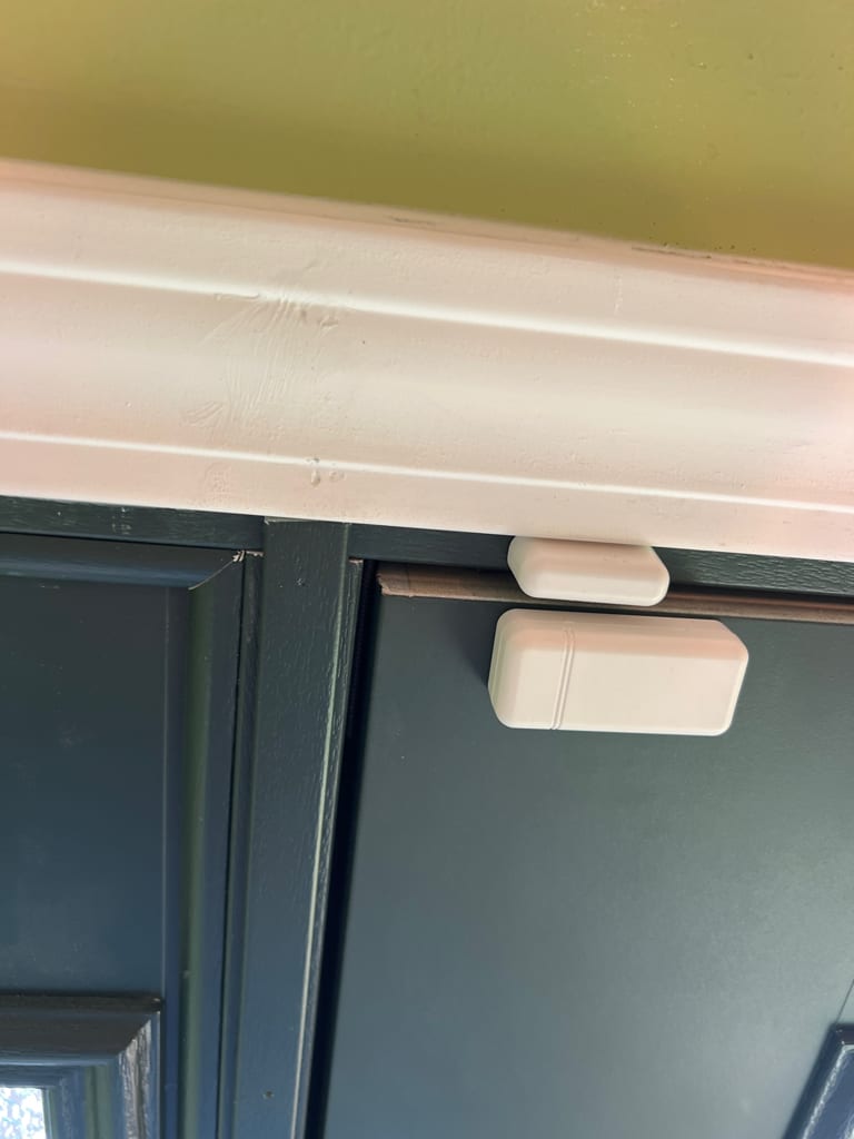 Another door with the same complaint: the top latch corner sits out past the frame at the head. UTS ServicePros field photo.